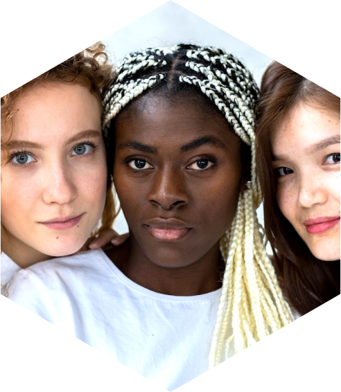 Three young women posing for a photo.