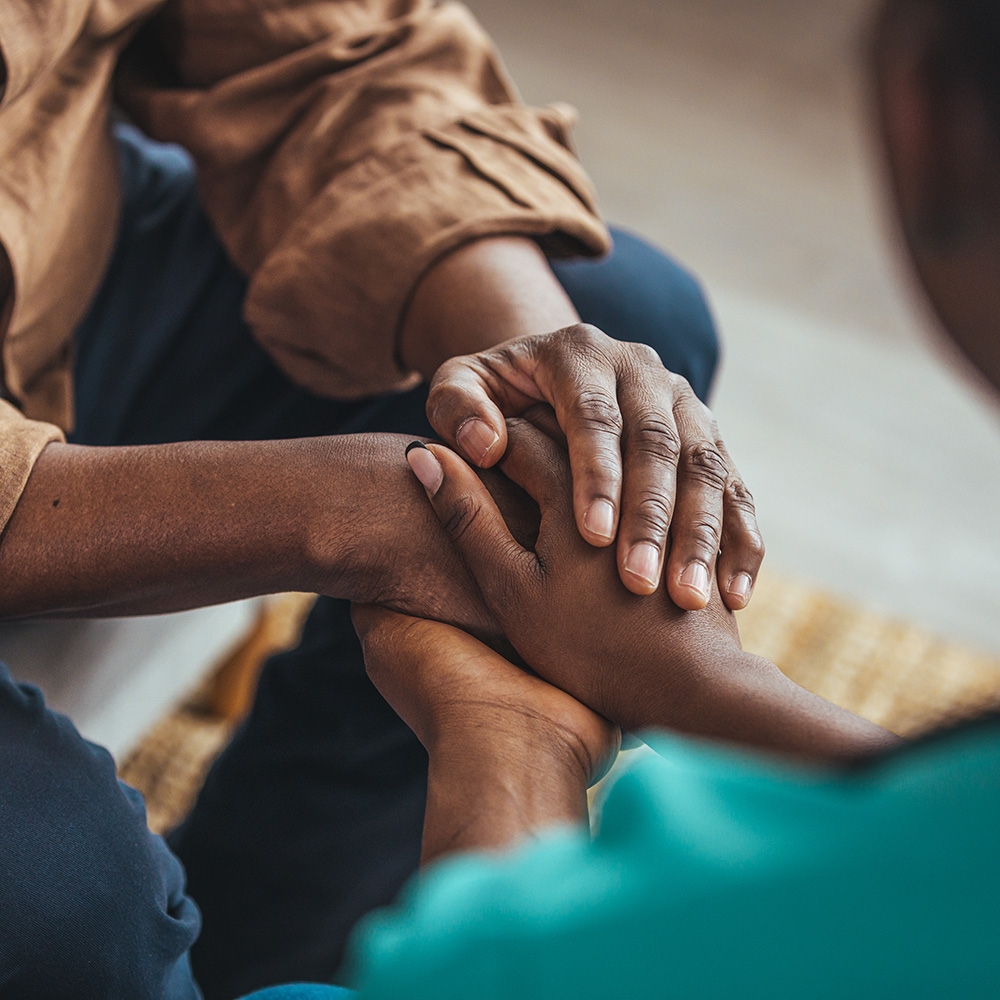 A man and woman holding hands.